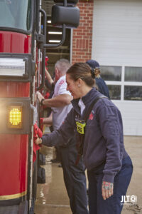 Chief Wade wiping down new engine